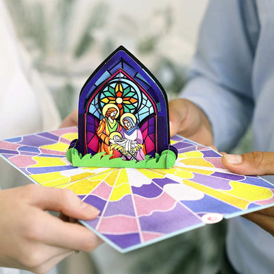 img src="Holy-Family-Stained-Glass-pop-up-card-model-2.jpq" alt="Christmas card for family"
